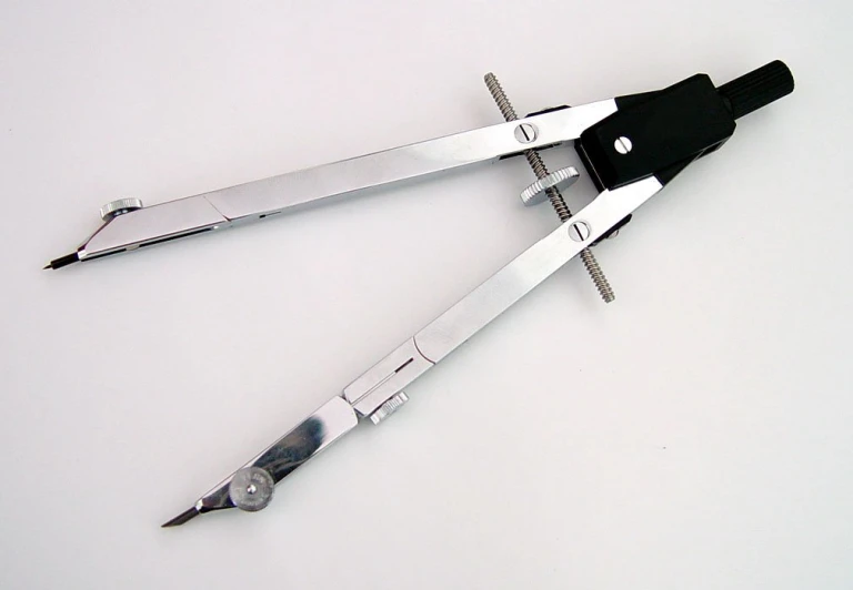 a pair of scissors sitting on top of each other