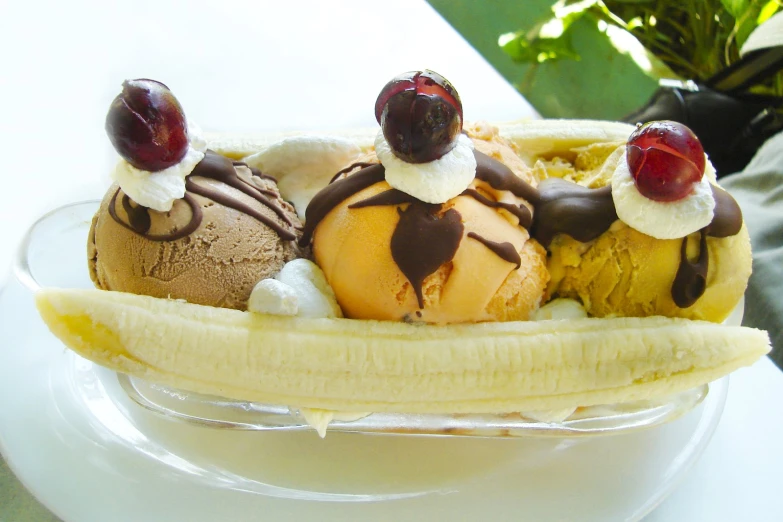 the small dessert contains bananas and cherry