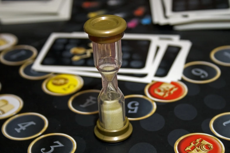 a hourglass with the numbers two to four printed on it