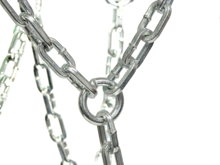 a pair of chains attached to a large metal object