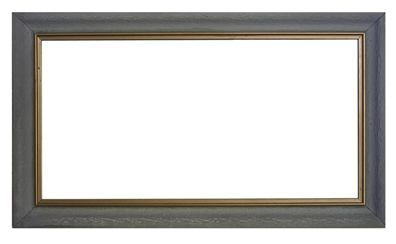 a gold frame is standing on a white surface