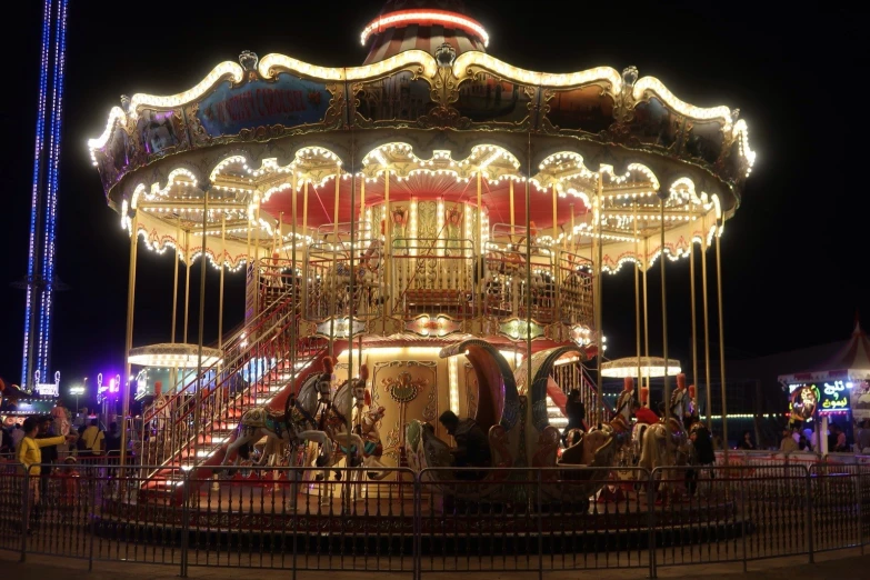 a carousel ride at night on the park