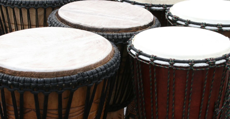 many drums and drum stands with snow on them