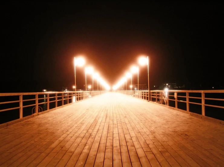 a dock that is lit up with lights