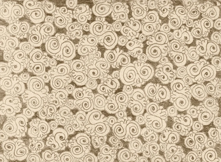 an old paper is decorated with brown swirls
