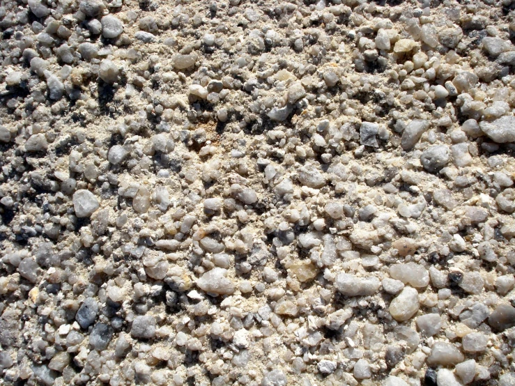 an up - close picture of a white rocks and gravel texture