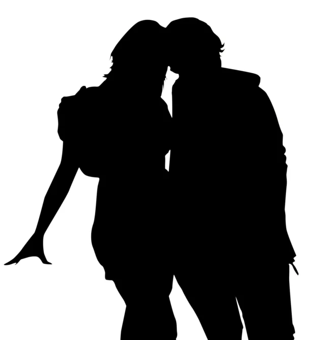 silhouette of a woman kissing a man on the cheek