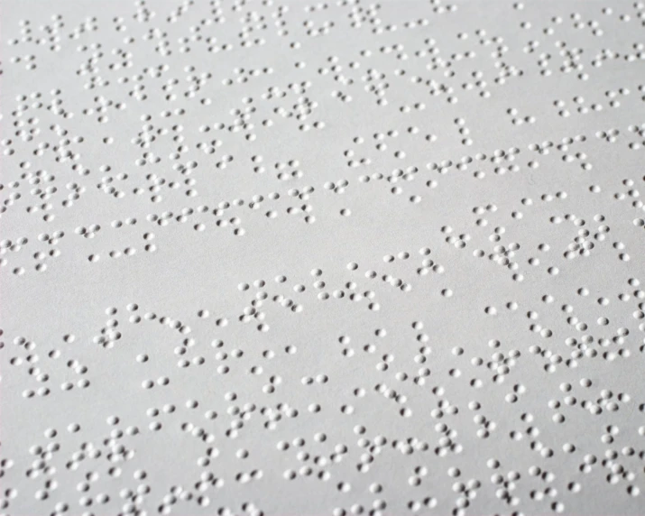 a close up image of a surface with perforated materials