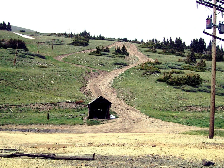 a small tunnel on a dirt road