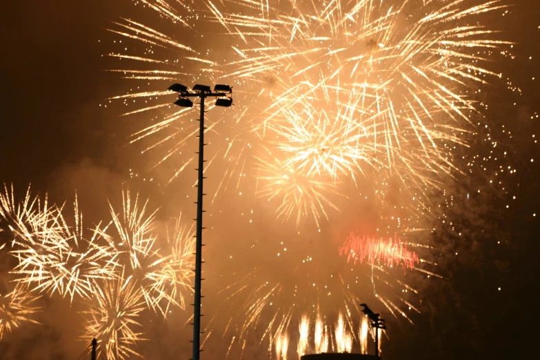 a very big fireworks in the sky over some kind of building