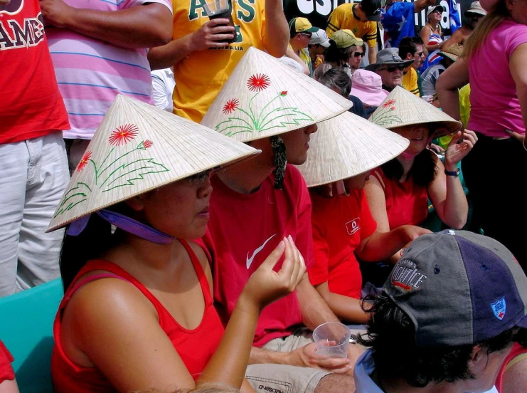 some people are wearing hats on their heads