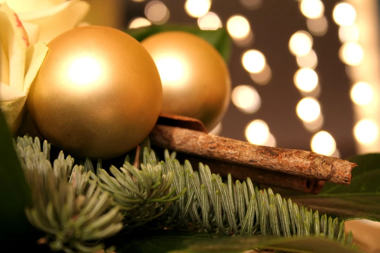 an arrangement of christmas decorations and decorations on a table