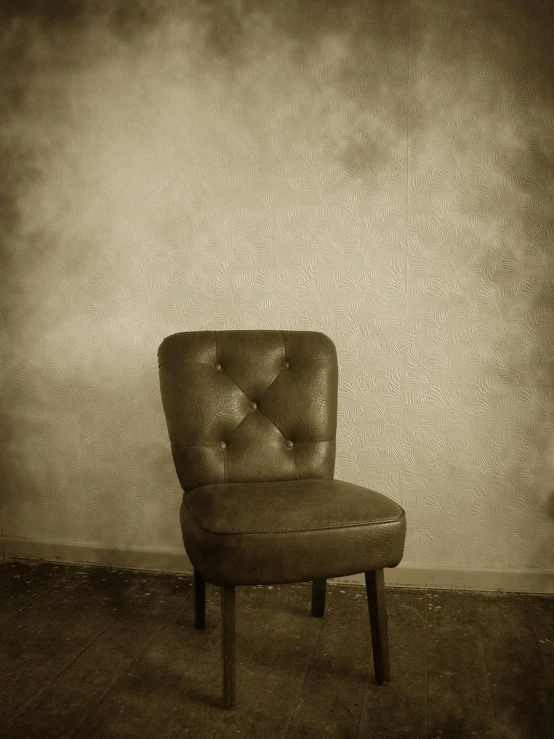 a chair sitting on top of a wooden floor