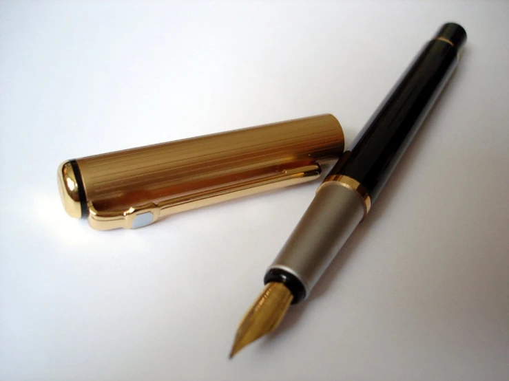 pen with black tip on a white surface