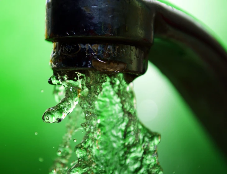 a faucet that is leaking out of the water