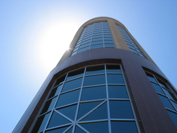 a closeup view of a tall building with very many windows