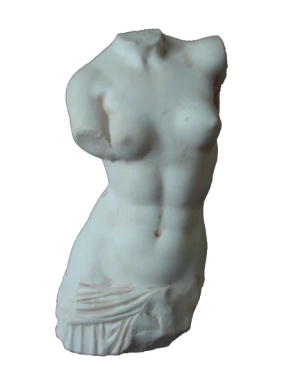 a white statue that is in the middle of a body