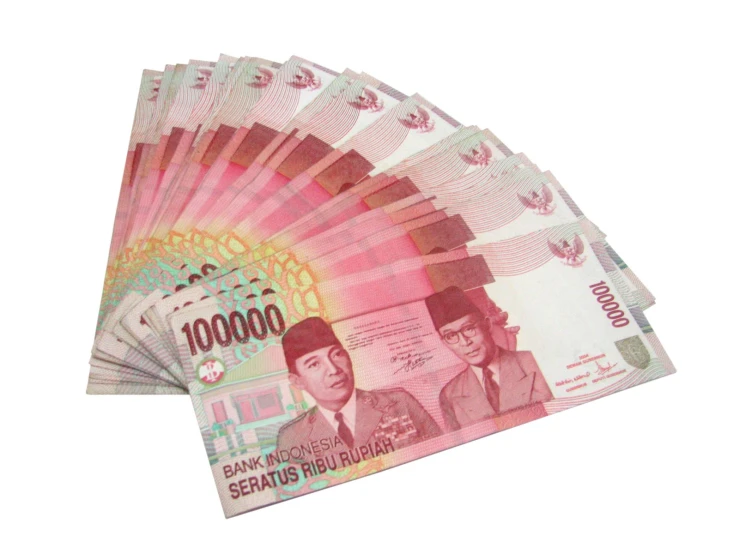 chinese bank notes are displayed in front of the white background