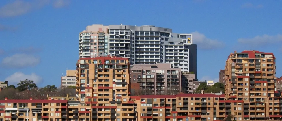 an image of several apartment buildings in a city