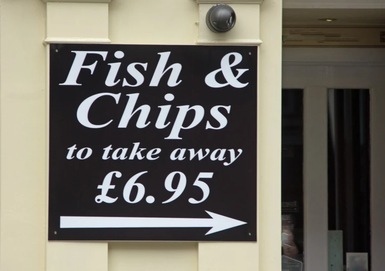 sign for fish & chips to take away from shop