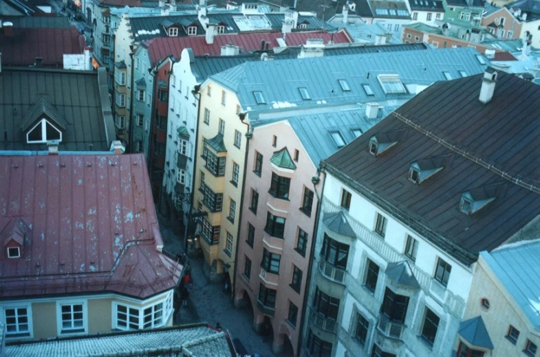 aerial view of a city with buildings and a clock tower