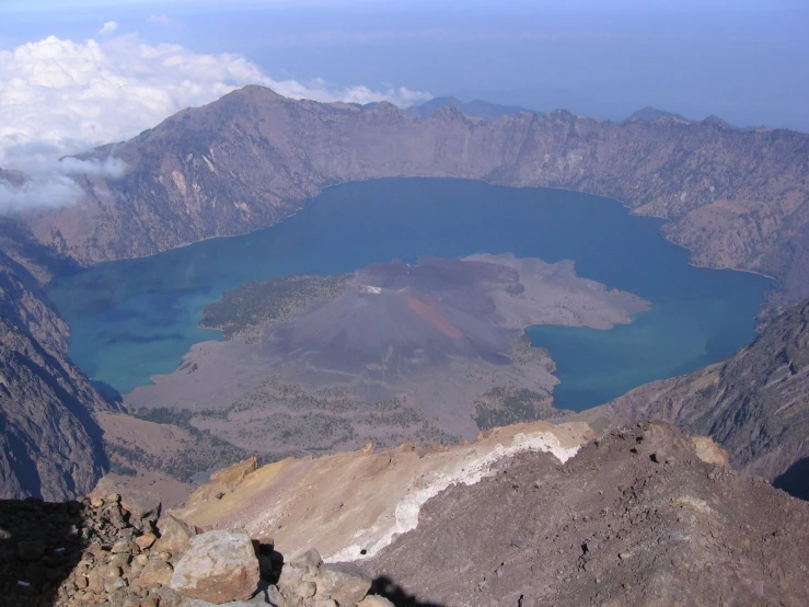 the view from the top of the mountain overlooking the lake