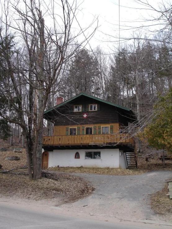 a home sits next to a wooded area and is very vacant