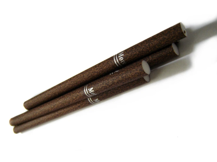 a couple of small brown sticks next to each other