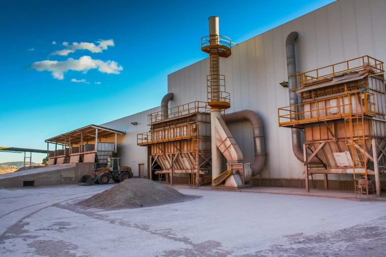 an industrial machinery plant sitting in front of a building