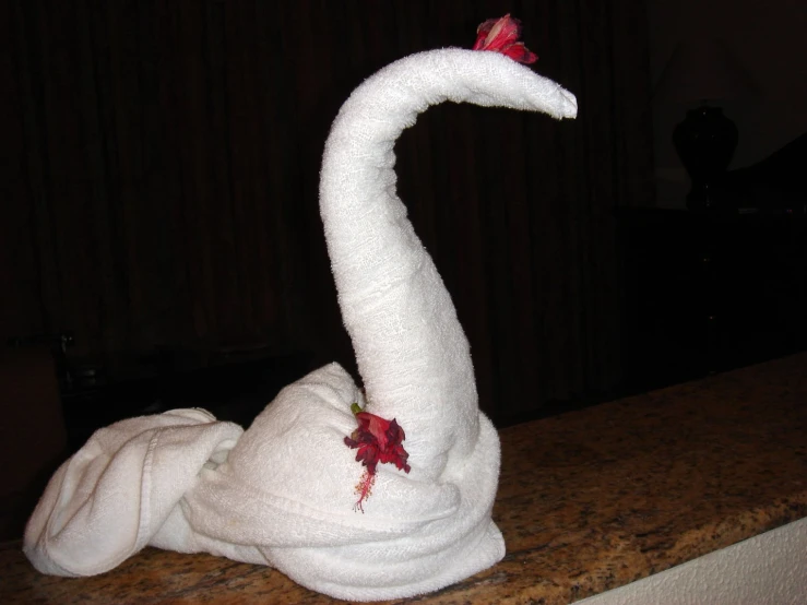 a towel with a bird on it in a el room