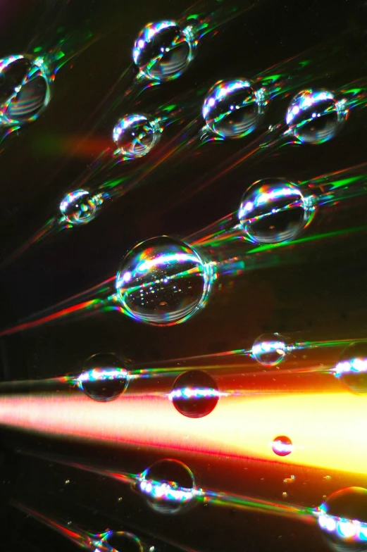 many bubbles with rainbow light and reflection
