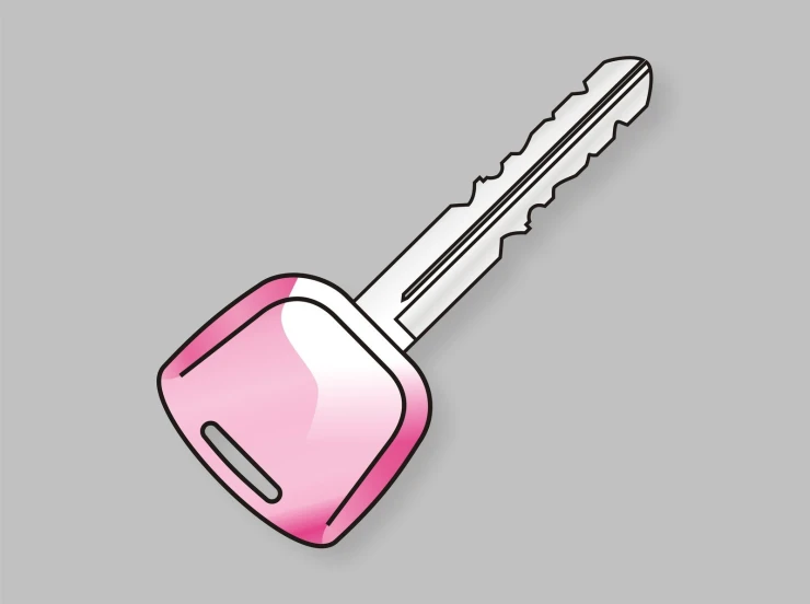 the pink car key is on the gray surface