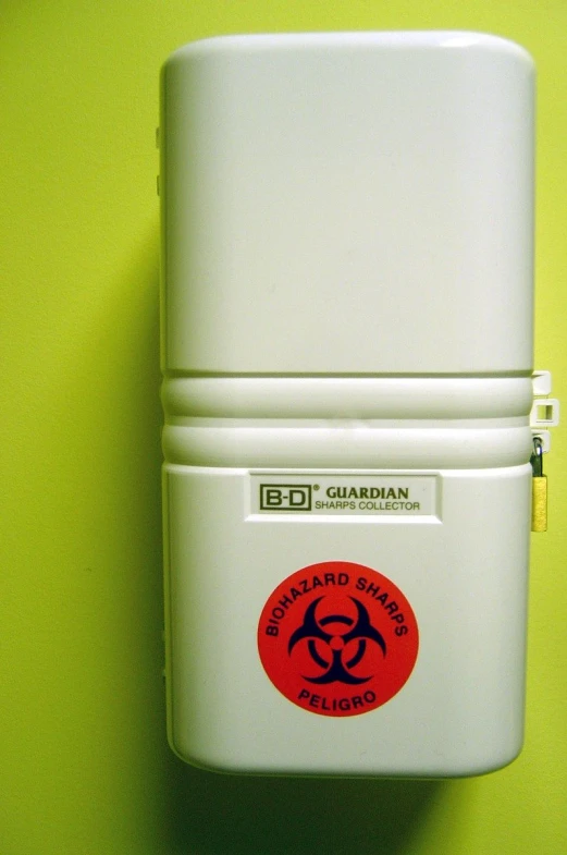 a white medical alert box attached to a wall