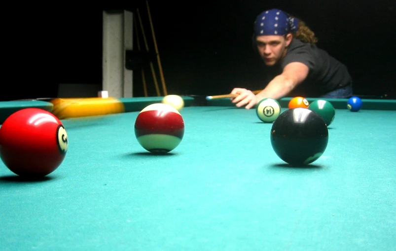 the pool balls are all lined up near the player