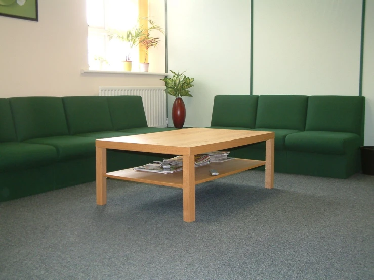 a living room with couches and tables in the middle