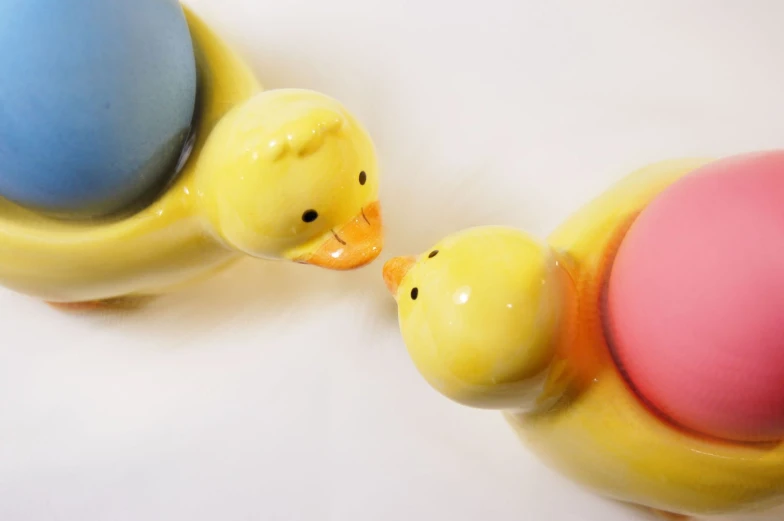 a group of two rubber ducks in the shape of a balloon