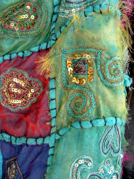 several pieces of fabric, including various designs and colors