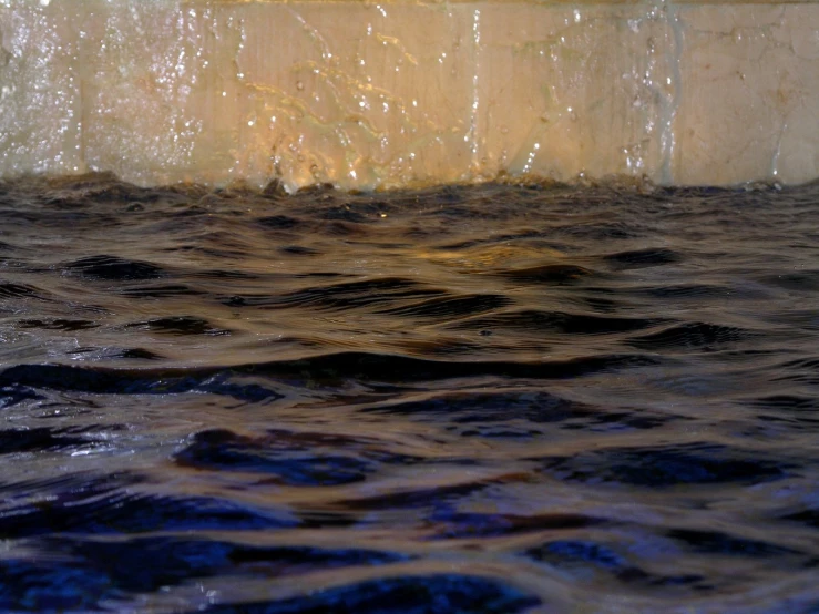 waves and light on an overcast day in the water