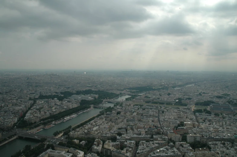 a very wide cityscape that includes the eiffel tower and other major buildings
