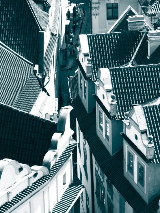 black and white picture of rooftops in urban setting