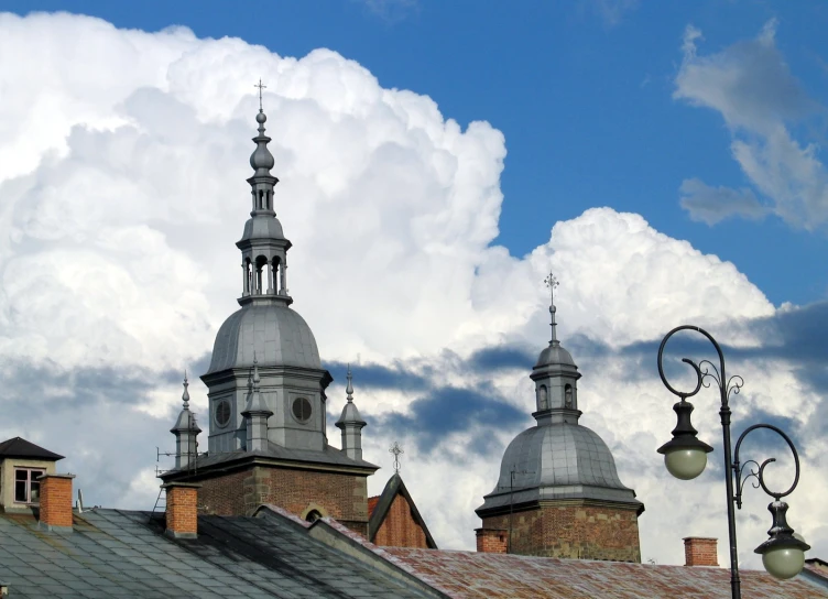 a view of roofs and spires of buildings