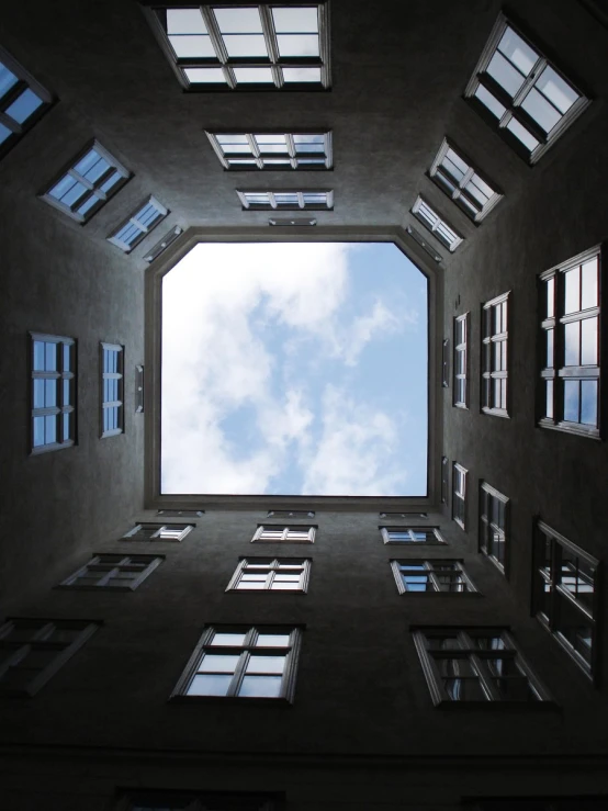 a picture of looking up at the sky and windows