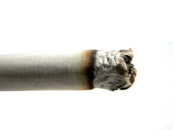 a cigarette has a smudge of brown