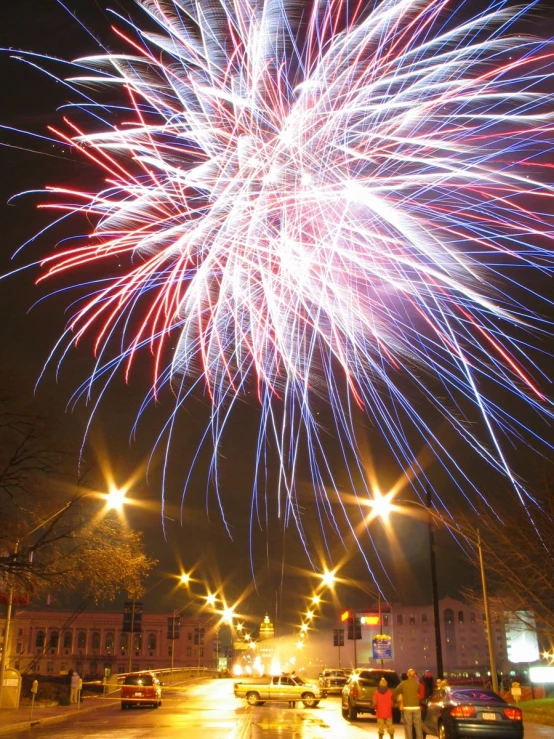 fireworks show in front of an apartment building
