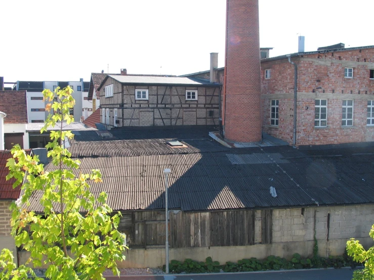 an old brick building and fire escape from above