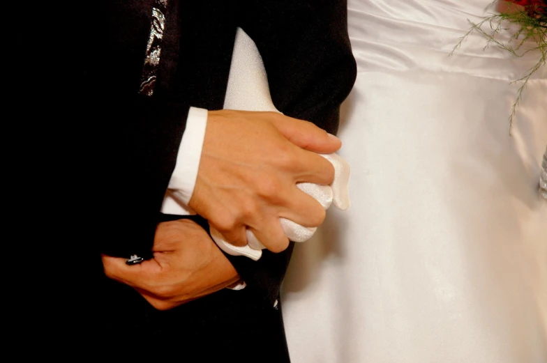 a wedding couple standing next to each other