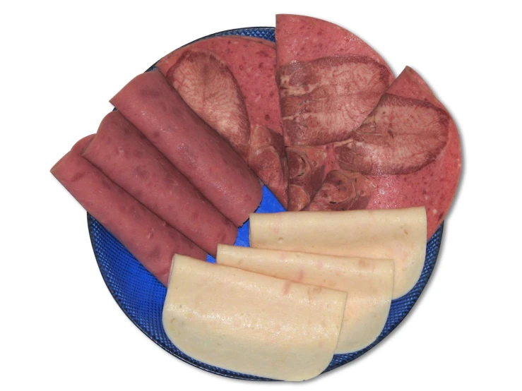 a plate filled with assorted sausages, meats, and cheeses