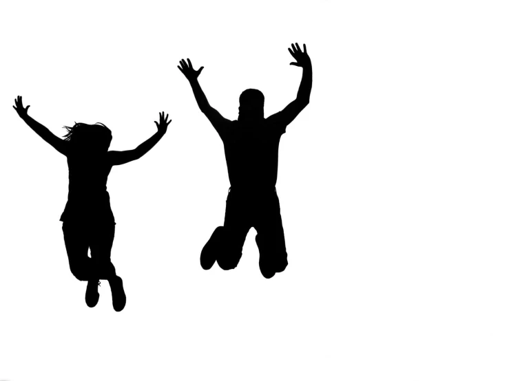two children jump high and are silhouetted against a white background