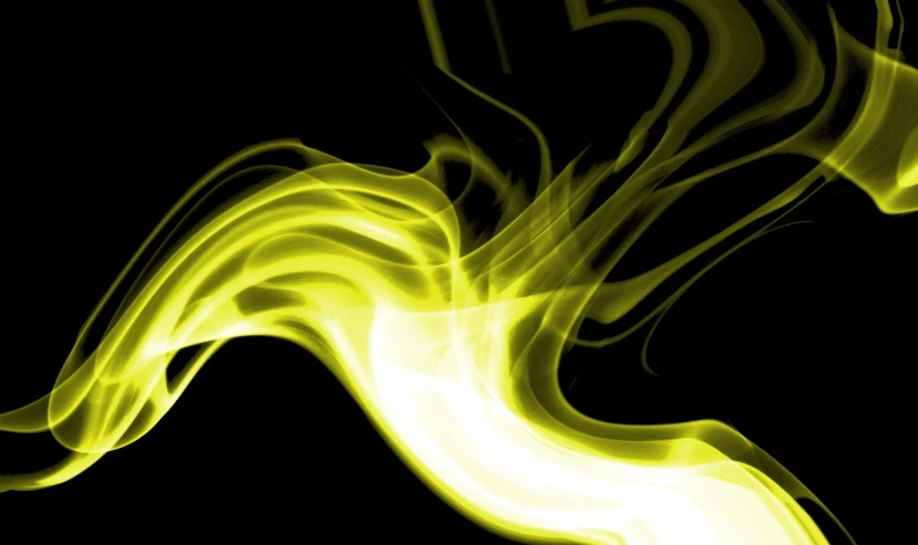 a yellow swirl on a black background