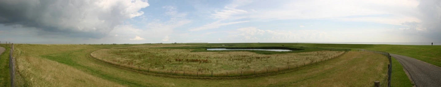 an aerial po of a large grassy field